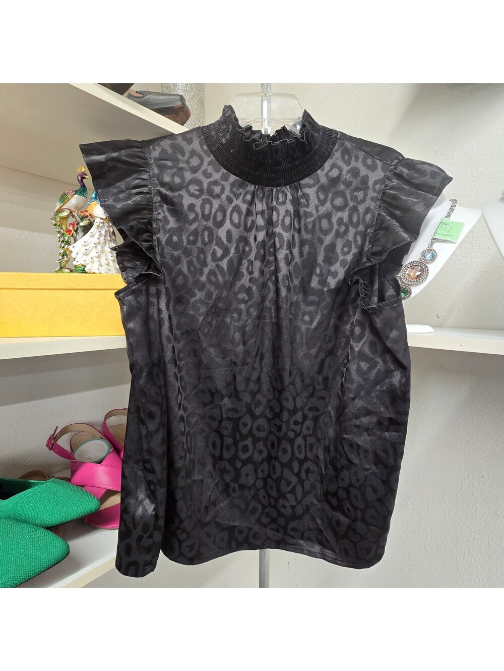 Large elegant black blouse featuring a subtle tonal leopard print